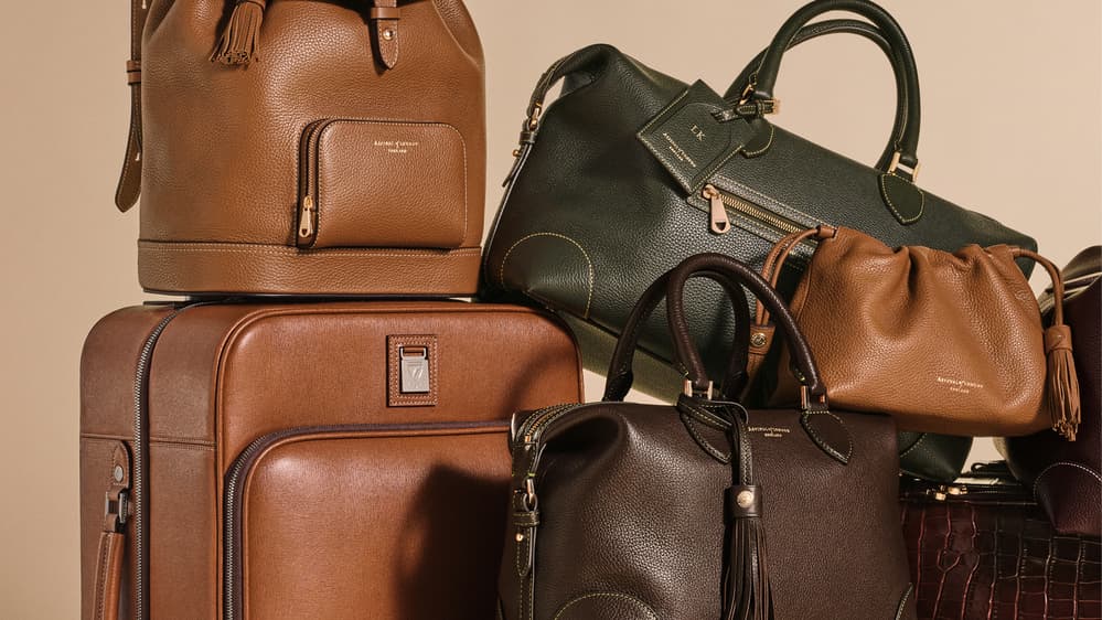 Image of brown and khaki travel bags