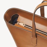 Zipped East West Tote with Shield Charm Smooth Tan