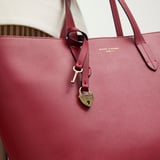 Zipped East West Tote with Heart Shaped Lock & Key Charm Cherry Red Soft Saffiano