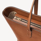 Zipped East West Tote with Shield Charm Tan Pebble