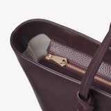 Zipped East West Tote with Shield Charm Fig Pebble