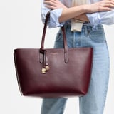 Zipped East West Tote with Shield Charm Fig Pebble