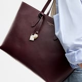 Zipped East West Tote with Shield Charm Fig Pebble