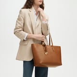 Zipped East West Tote with Shield Charm Tan Pebble
