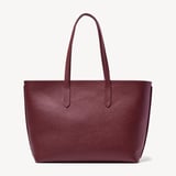Zipped East West Tote with Shield Charm Garnet Pebble
