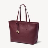 Zipped East West Tote with Shield Charm Garnet Pebble