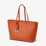 Zipped East West Tote with Shield Charm Marmalade Pebble