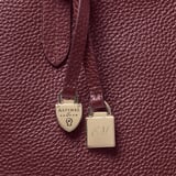 Zipped East West Tote with Shield Charm Garnet Pebble