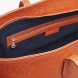 Zipped East West Tote with Shield Charm Marmalade Pebble