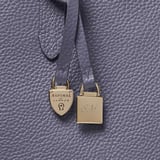 Zipped East West Tote with Shield Charm Dusky Blue Pebble