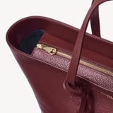 Zipped East West Tote with Shield Charm Garnet Pebble
