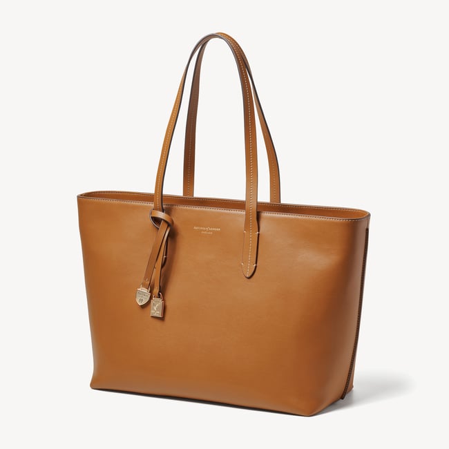Zipped East West Tote with Shield Charm Smooth Tan