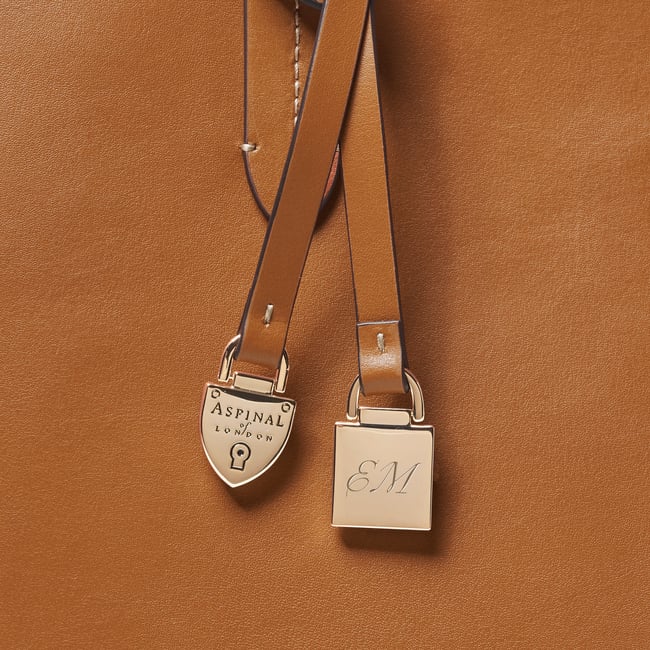 Zipped East West Tote with Shield Charm Smooth Tan