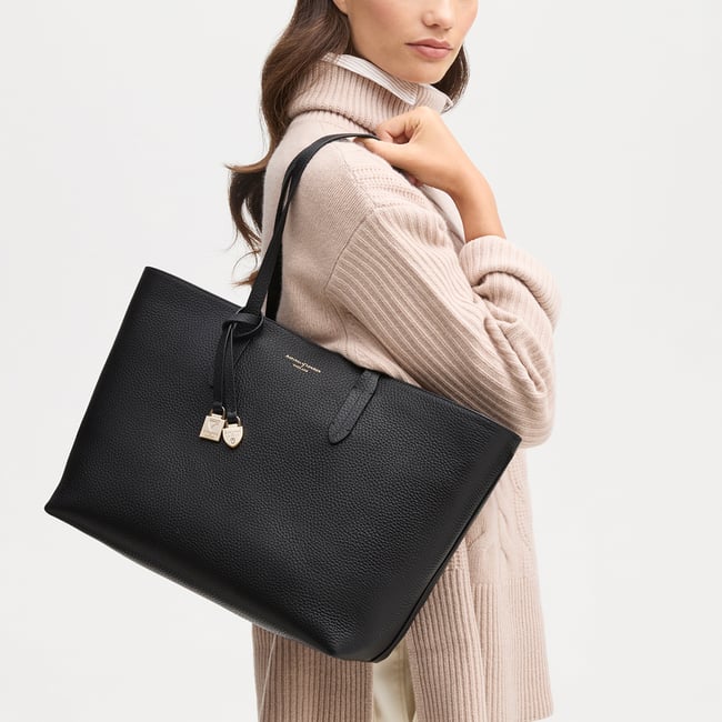 Zipped East West Tote with Shield Charm Black Pebble
