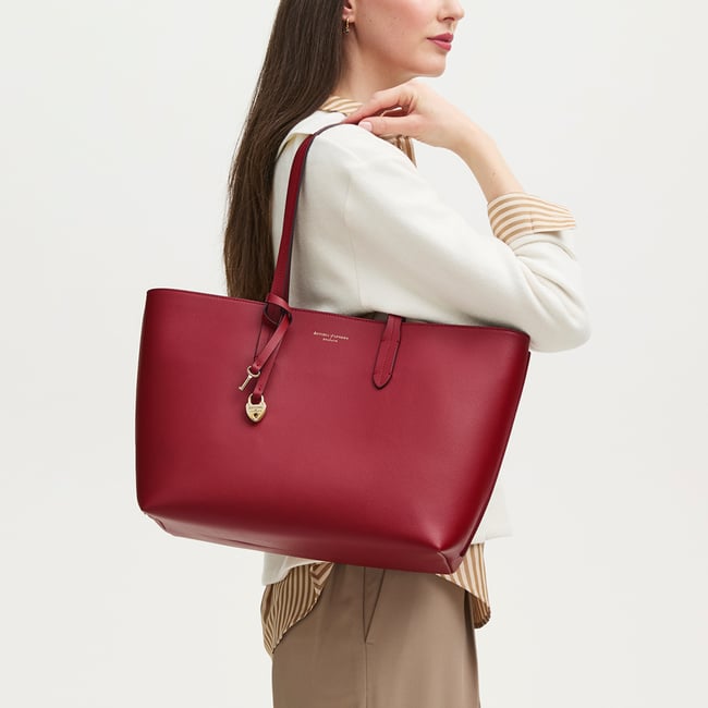 Zipped East West Tote with Heart Shaped Lock & Key Charm Cherry Red Soft Saffiano