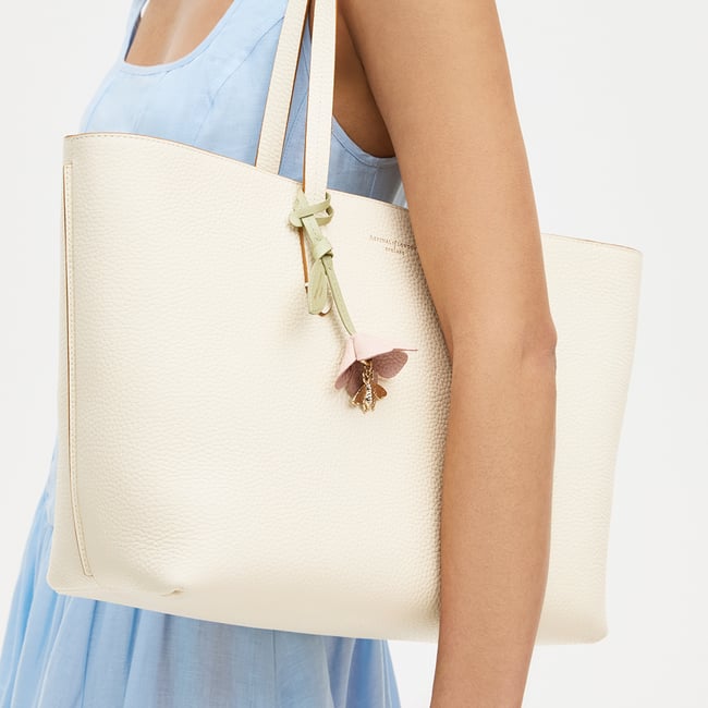 Zipped East West Tote with Bee & Flower Charm Ivory Pebble