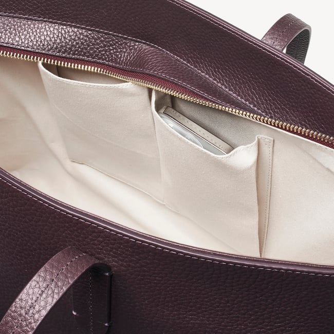 Zipped East West Tote with Shield Charm Fig Pebble