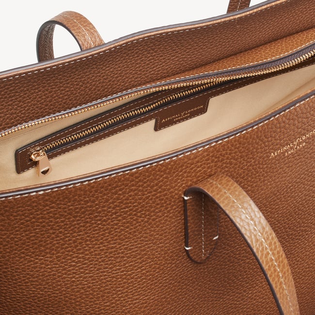 Zipped East West Tote with Shield Charm Tan Pebble