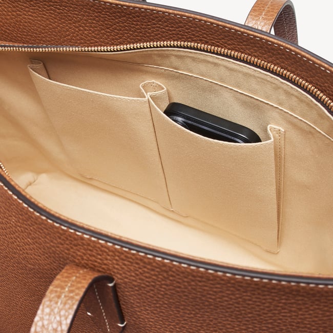 Zipped East West Tote with Shield Charm Tan Pebble