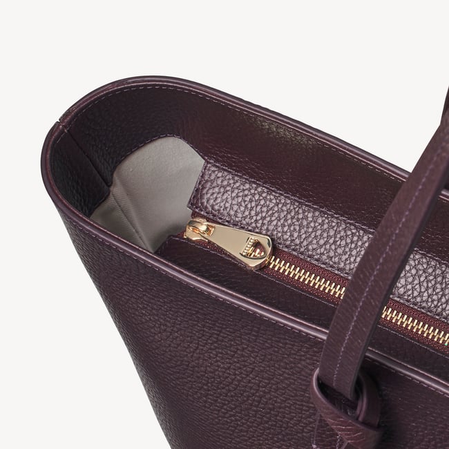 Zipped East West Tote with Shield Charm Fig Pebble