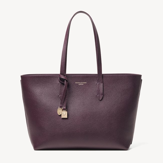 Zipped East West Tote with Shield Charm Fig Pebble