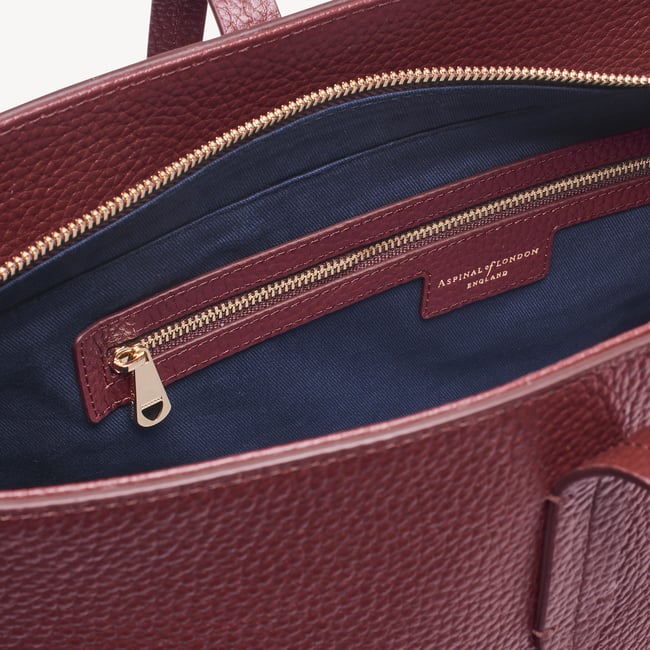Zipped East West Tote with Shield Charm Garnet Pebble