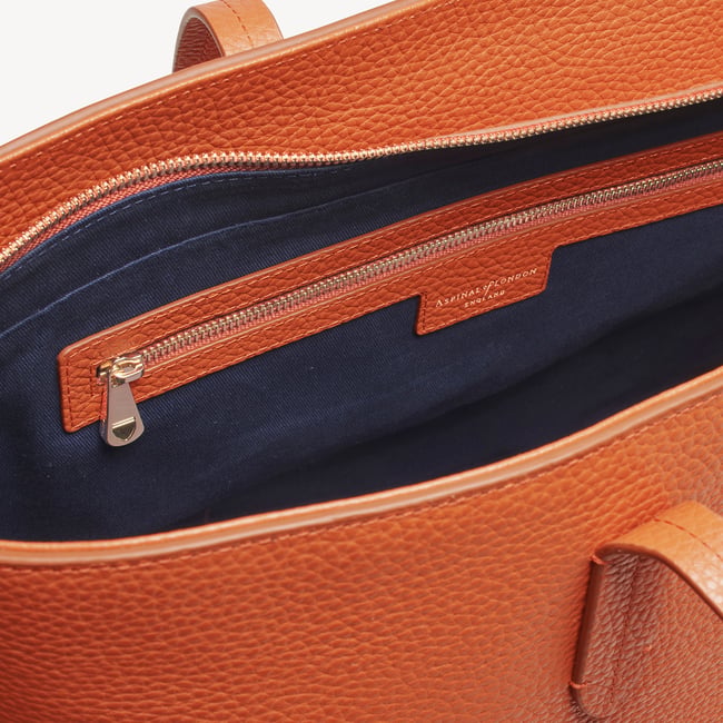 Zipped East West Tote with Shield Charm Marmalade Pebble