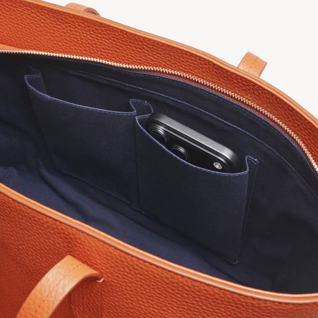 Zipped East West Tote with Shield Charm Marmalade Pebble