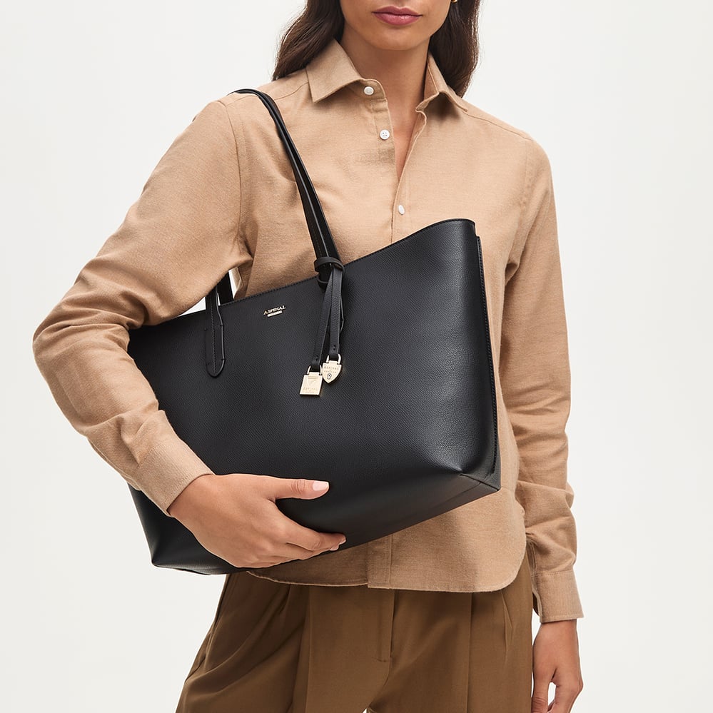 Zipped East West Tote with Shield Charm Black Soft Saffiano