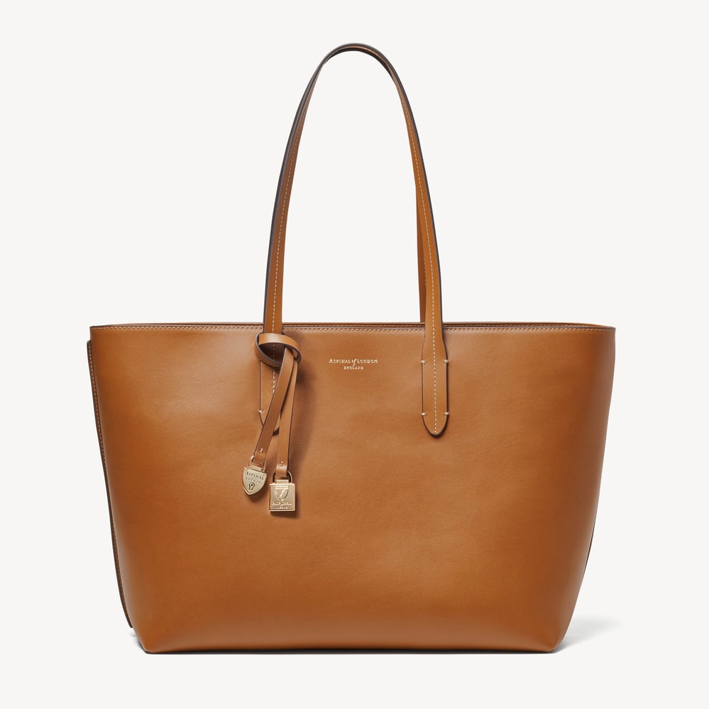 Zipped East West Tote with Shield Charm Smooth Tan