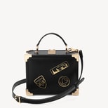 The Trunk in Smooth Black with Patches from Aspinal of London