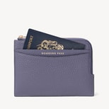 Zipped Travel Wallet in Dusky Blue Pebble from Aspinal of London