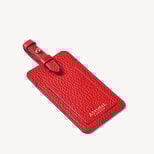 Luggage Tag in Cardinal Red Pebble from Aspinal of London