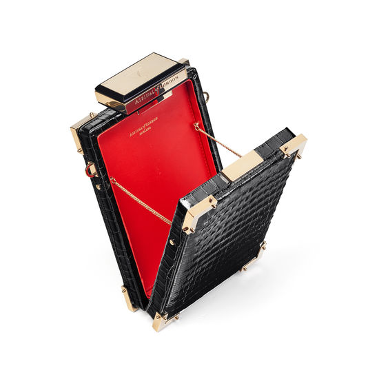 Sabine Portrait Trunk Clutch in Deep Shine Black Small Croc from Aspinal of London