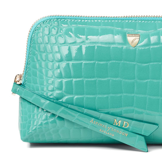 Small Essential Cosmetic Case in Chalkhill Blue Patent Croc from Aspinal of London