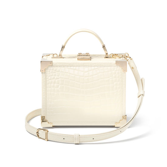 The Trunk in Ivory Patent Croc from Aspinal of London
