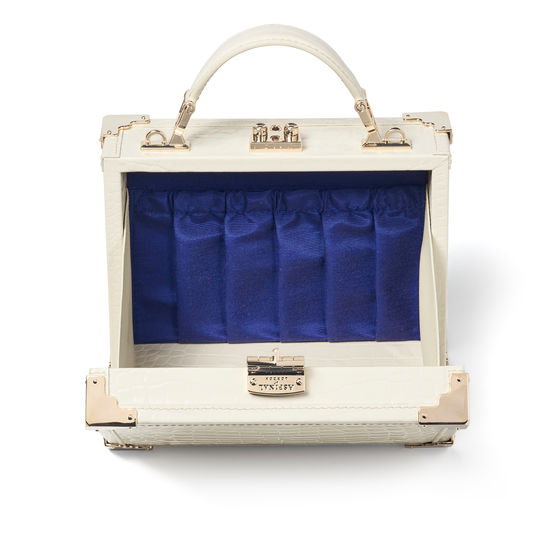 The Trunk in Ivory Patent Croc from Aspinal of London