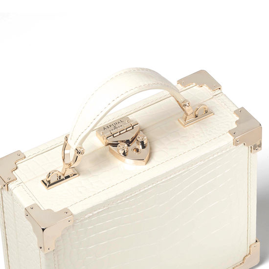 The Trunk in Ivory Patent Croc from Aspinal of London