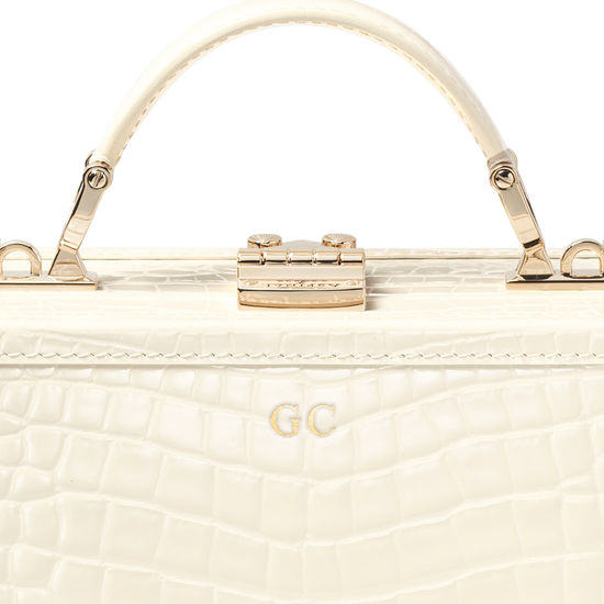 The Trunk in Ivory Patent Croc from Aspinal of London