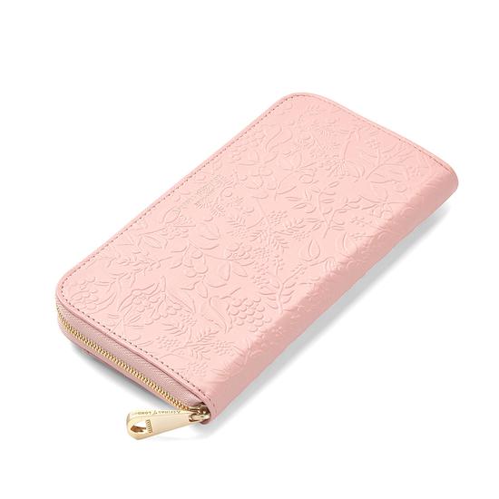Continental Clutch Zip Wallet in Peach Embossed Flower from Aspinal of London