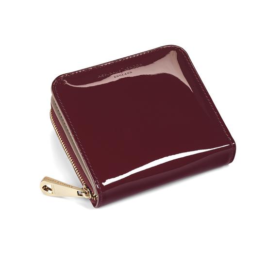 Mini Continental Zipped Coin Purse in Deep Shine Cherry Patent from Aspinal of London
