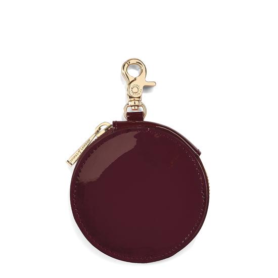 Round Coin Purse with Keyring in Deep Shine Cherry Patent from Aspinal of London
