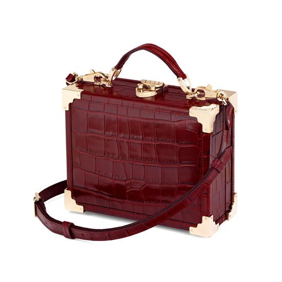 Mini Trunk Clutch in Deep Shine Bordeaux Croc with Zig Zag Strap from Aspinal of London