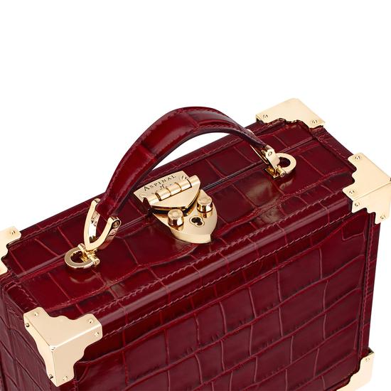 Mini Trunk Clutch in Deep Shine Bordeaux Croc with Zig Zag Strap from Aspinal of London