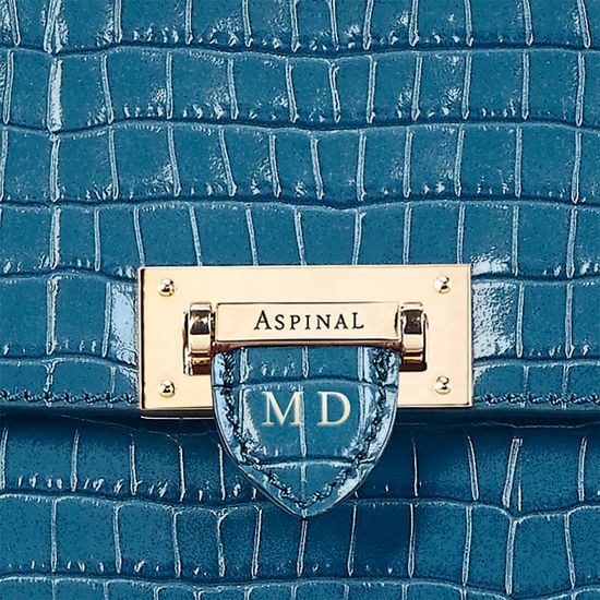 Soho Backpack in Deep Shine Topaz Small Croc from Aspinal of London