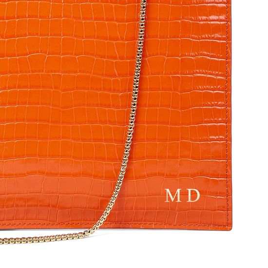 Soho Clutch in Deep Shine Amber Small Croc from Aspinal of London